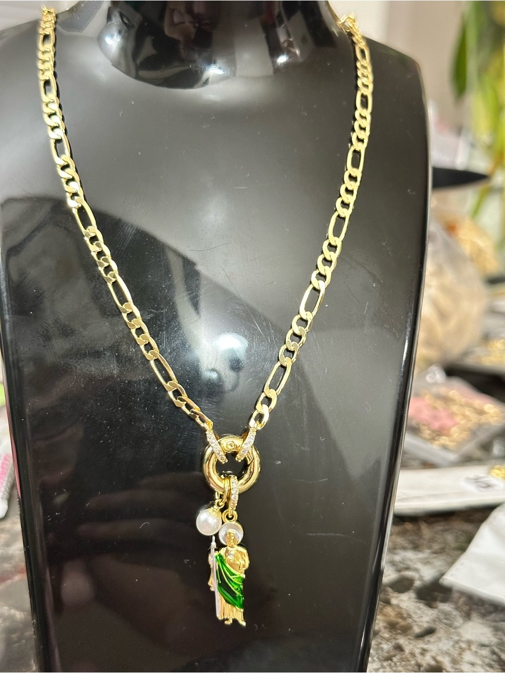 Gold-Tone Figaro Necklace with Green Enamel Saint Pendant and Pearl Charm